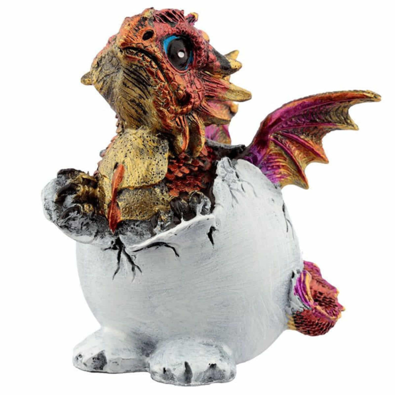 Imagen figura dragón saliendo del huevo rojo Imagen figura dragón saliendo del huevo rojo